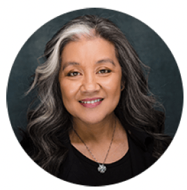 Headshot of a woman with gray hair