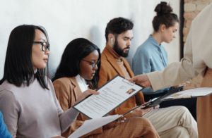 Group of colleagues reviewing a document together
