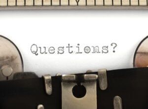 Questions title on a typewriter