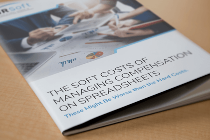 Printed HRSoft guide titled 'The Soft Costs of Managing Compensation on Spreadsheets'