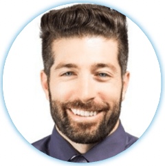 Headshot of a smiling man with a beard