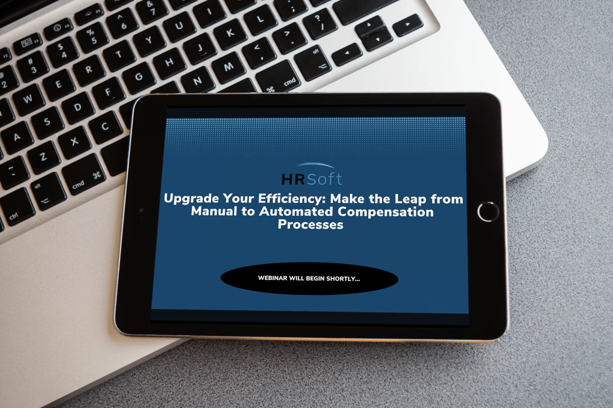 Tablet displaying an HRSoft webinar on automating compensation processes