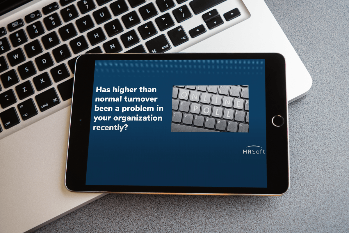 Tablet displaying an HRSoft webinar about employee turnover