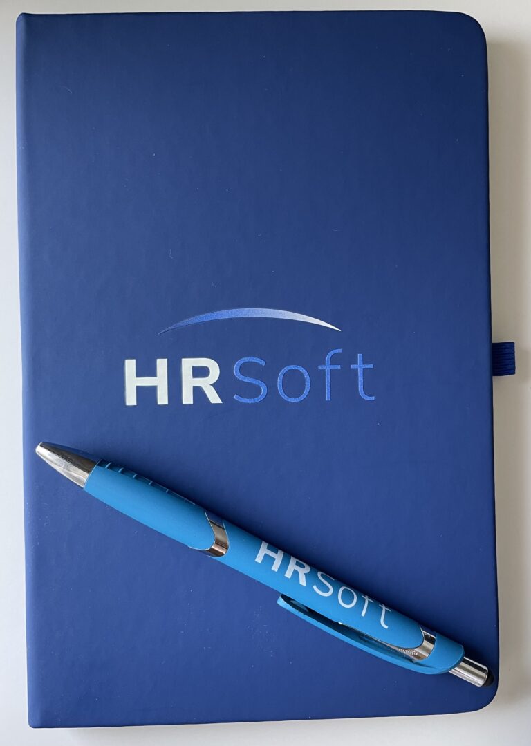 HRSoft-branded journal with a pen