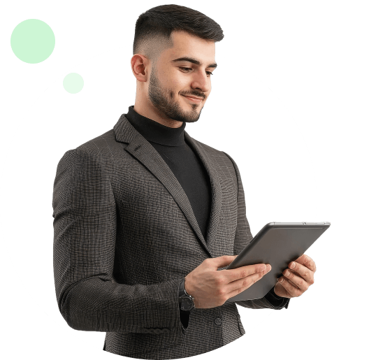 Man in a suit holding a tablet