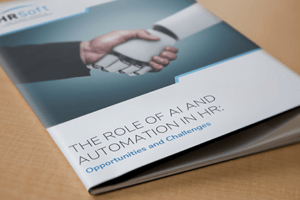 Printed HRSoft guide titled 'The Role of AI and Automation in HR'