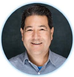 Headshot of a smiling man
