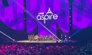Stage at the UKG Aspire conference with an audience
